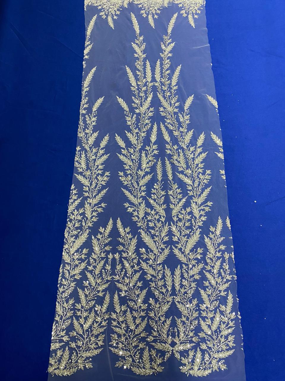 BORDADO COM PEDRARIA TM0610367A